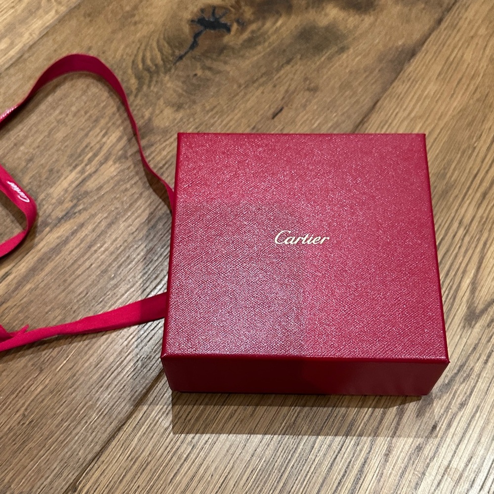 Cartier red jewelry box with ribbon